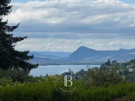 barnes annecy - menthon st bernard : terrain constructible vue lac