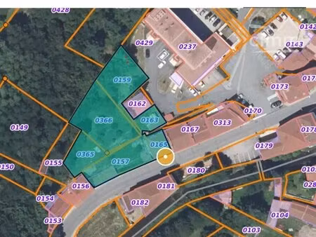 immeuble de rapport avec 2 appartements et 1 commerce sur 1754 m² de terrain constructible
