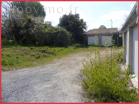 vente terrain constructible 597m2 avec garages