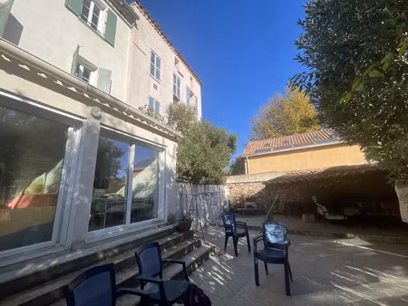 immeuble de 5 appartements loués et un commerce