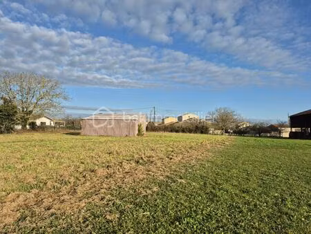 terrain de 2 440 m² à mauze-sur-le-mignon