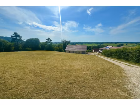 10 min de saint vit - terrain constructible viabilisé