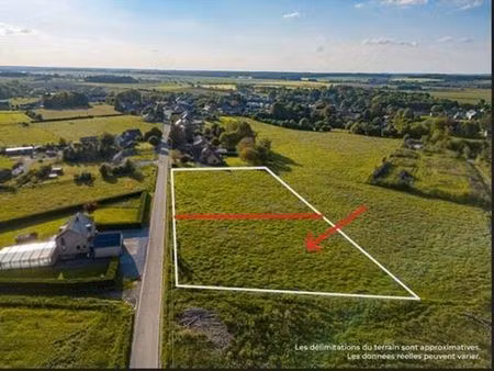 terrain à bâtir situé dans le charmant village de rosée