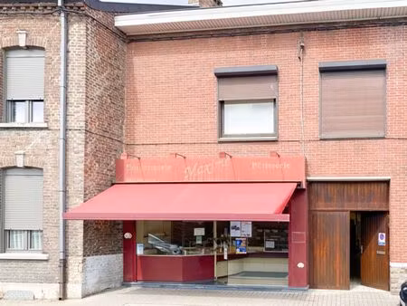 immeuble commercial avec maison  atelier et grand jardin !