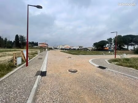 terrain 313 m² theza