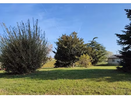 vente terrain 1400 m² à saint-quentin-de-baron (33750)  110 000 €