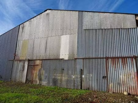 vente garage et parking à loué (72540) : à vendre / 300m² loué