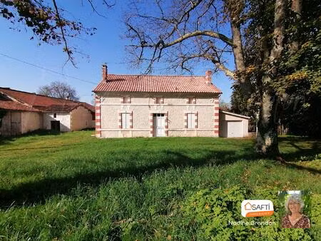 façade en pierre apparente  toiture refaite  jardin clos