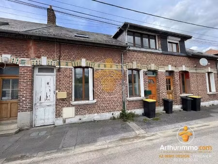 maison mitoyenne composée de deux appartements