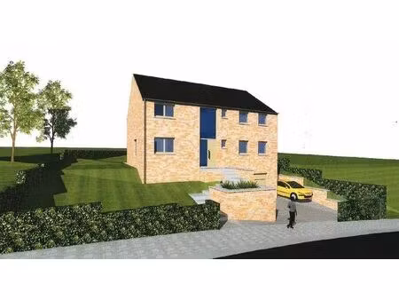 beau terrain à bâtir avec permis déjà octroyé