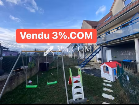 3%com beau triplex avec jardin et garage.