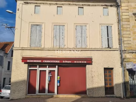 ensemble immobilier composé d'une boucherie et un appartemen