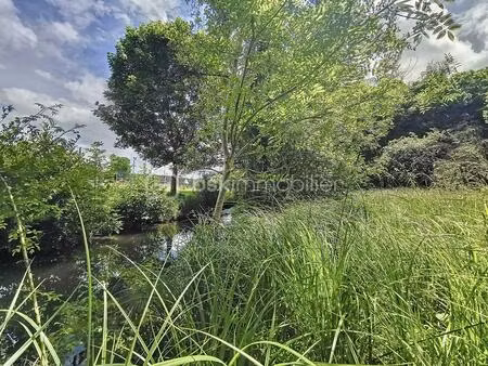 terrain de 2 439 m² à longchamp