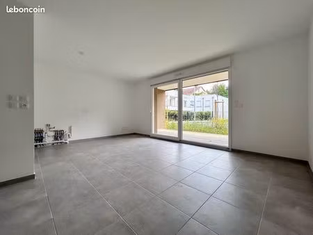 appartement en rez-de-jardin 67 m² • 3 pièces • 2 chambres • terrasse 11 m² • jardin de 20