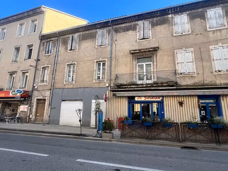 immeuble 7 appartements et 2 commerces