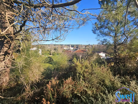 terrain à bâtir de 1100m² avec vue panoramique sur le village