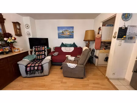 appartement en rez-de-jardin  2 chambres  garage et place de stationnement