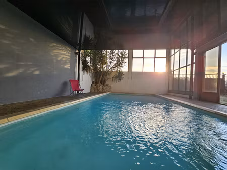 maison 650 m2 piscine intérieure