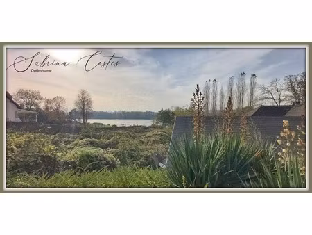 terrain de loisirs en bord de seine de 1 517 00 m² à pressagny l'orgueilleux