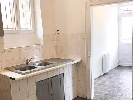 maison divisée en 2 appartements