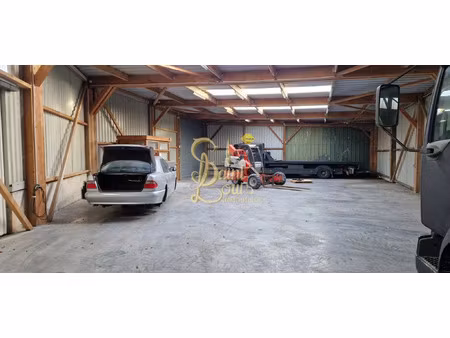 garage de 220 m2 env