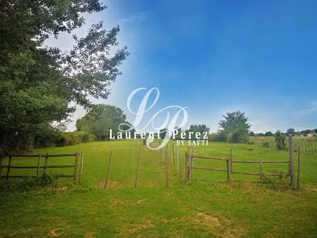 terrain de 9515m² situé en zone future d'urbanisation