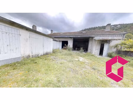 en exclusivité ! dépôt bourg argental avec garage et terrain