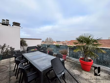appartement t2 - 50 m2 avec terrasse de 50 m2 - garage et cave
