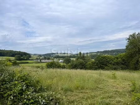 grand terrain 5720 m2 viabilisé avec jolie vue dégagée