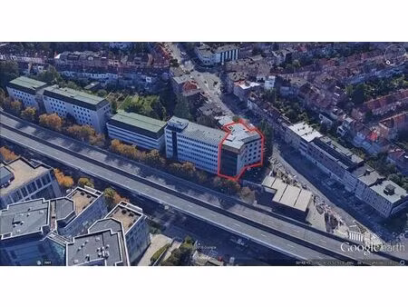 immeuble de bureaux de +/- 2400 m² + parkings en sous-sols