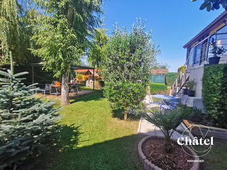 maison 4 ch   2 salles d'eau  sous sol aménagé   jardin arboré  véranda  garages