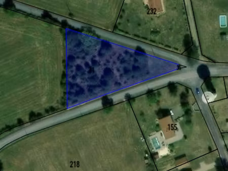 grand terrain constructible avec cu à flavignac