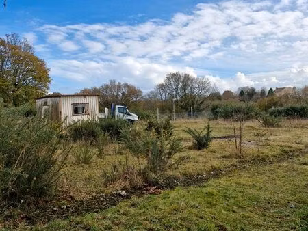 a vendre terrain environ 1000 m2 sur la zone d'activité artisanale de moustoulgoat 29380 b