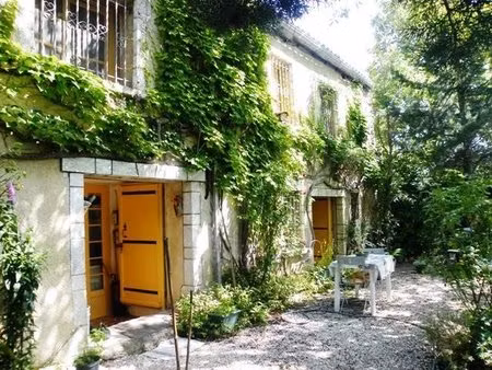 ferme en pierre avec jardin en terrasses et piscine  vues à couper le souffle  divisée en 