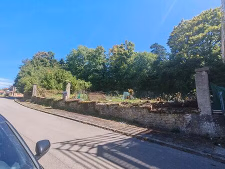 terrain 9 ares dans quartier calme  proche toutes commodités