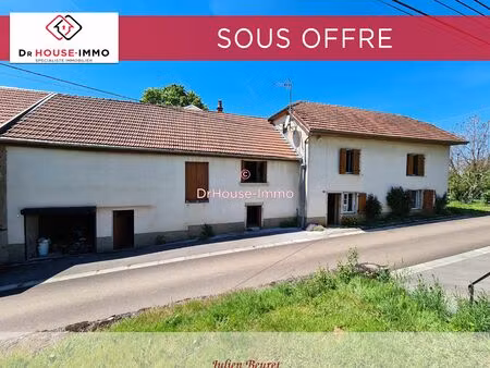 maison mitoyenne à rénover d'une surface de 130m² édifiée sur un terrain de 608m²