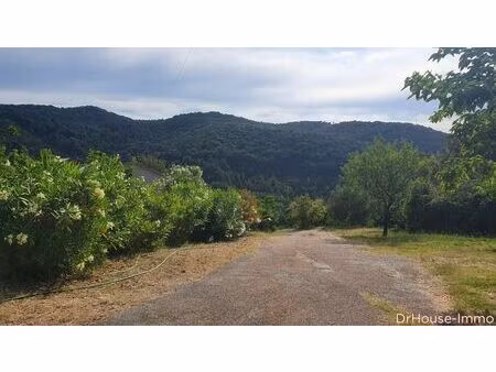 batiment. dependances. magasin. 4 logements. terrain arbore. garage