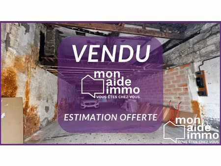 garage en pierre de 130m² idéal investisseur plein centre-vill
