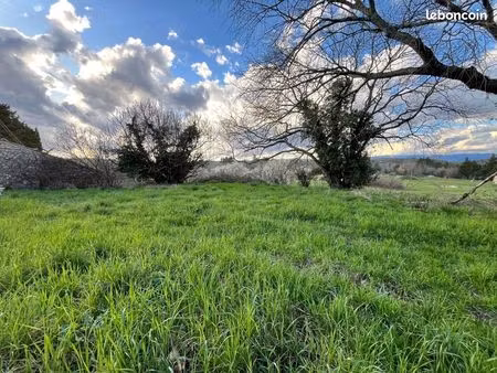 terrain 1 130 m² les assions