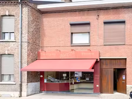 immeuble commercial avec maison  atelier et grand jardin !