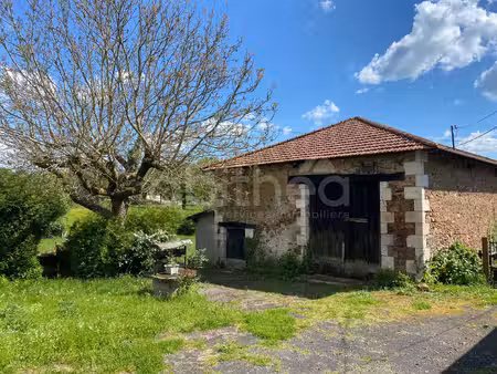 maison mitoyenne et sa grange amenageable avec terrain de 20