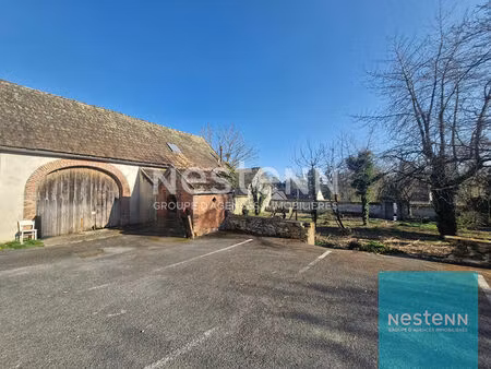 grange et terrain à bâtir disposant de plusieurs possibilités d'aménagement au coeur de mo