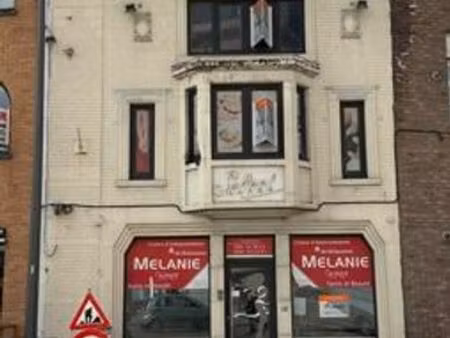 maison de commerce de +-120m² avec partie privée et cour