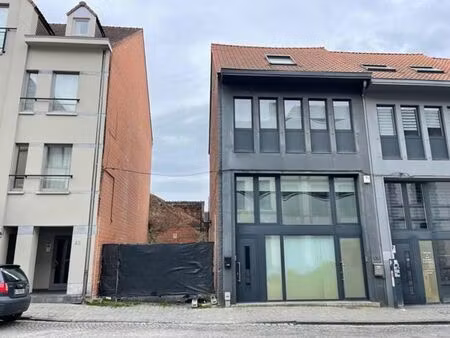 espace commercial 150m² + jardin  cave & terrain 50m²