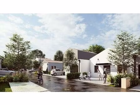 ensemble résidentiel comprenant 21 appartements et 14 maisons individuelles.