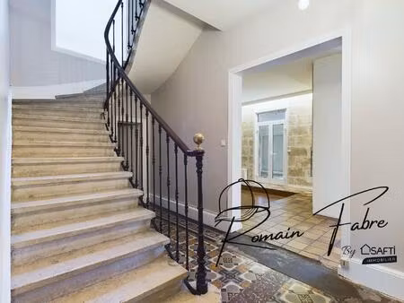 immeuble avec logements de 5 chambres et 2 commerces loués centre cavignac  rentabilité im