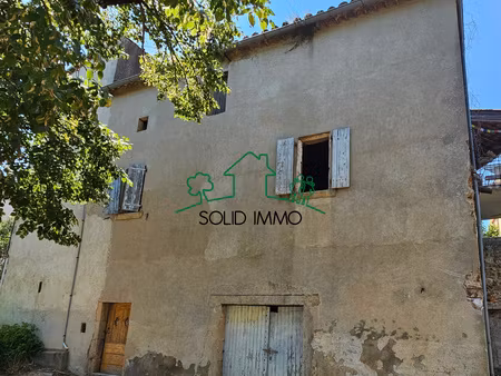 maison de village à rénover avec box et terrain constructibl