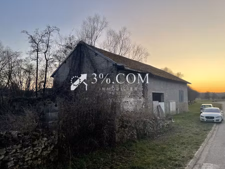 pettonville  terrain constructible 3000 m² avec dépendance et ruisseau