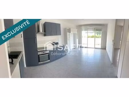 appartement deux pièces avec terrasse stationnements privatifs et cave