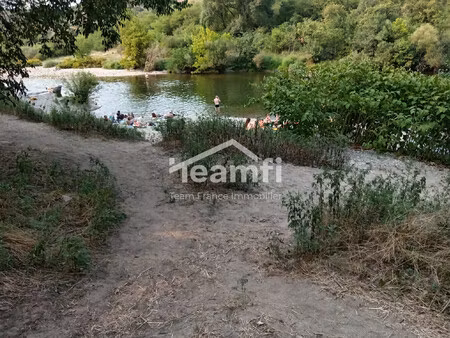 terrain de loisir  camping en zone naturelle avec plage privée